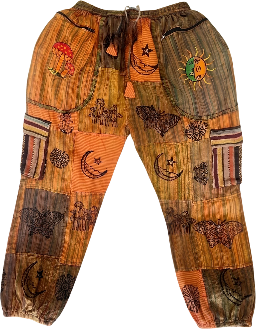 Kathmandu Clay — burnt orange patchwork trousers with butterflies.