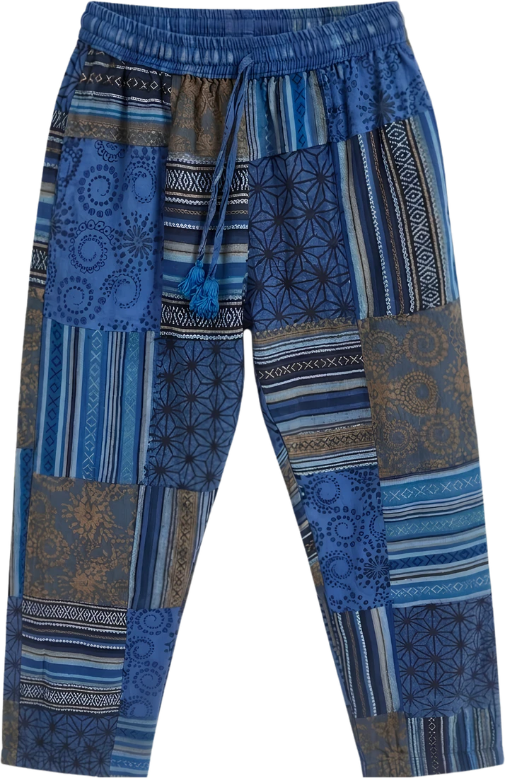 Indigo Quilt — blue and brown square-patchwork trousers.