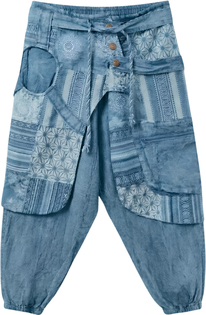 Chambray Fold — pale blue wrap-panel drop-crotch trousers.