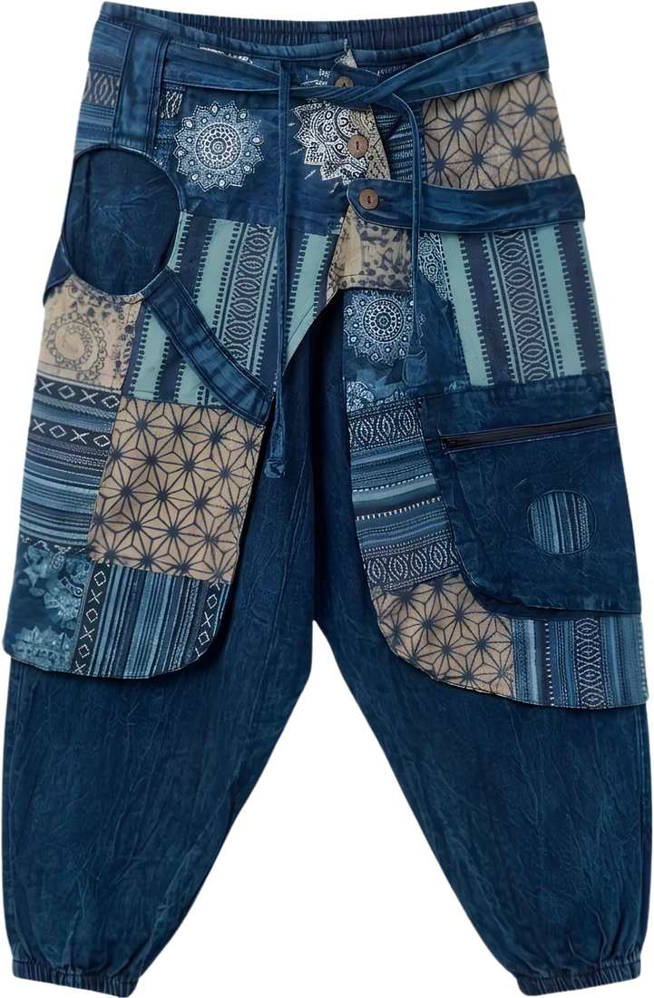 Indigo Fold — indigo wrap-panel drop-crotch trousers.