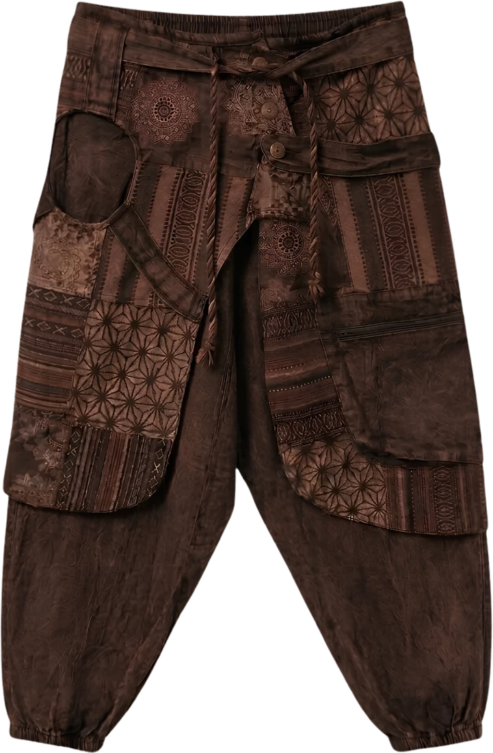 Walnut Fold — brown wrap-panel drop-crotch trousers.